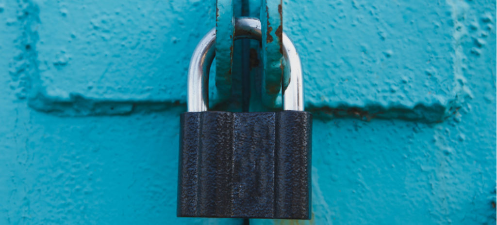 Image of lock on bright blue background