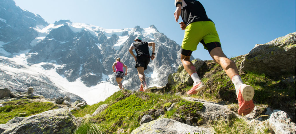Image of people trail running up a mountain