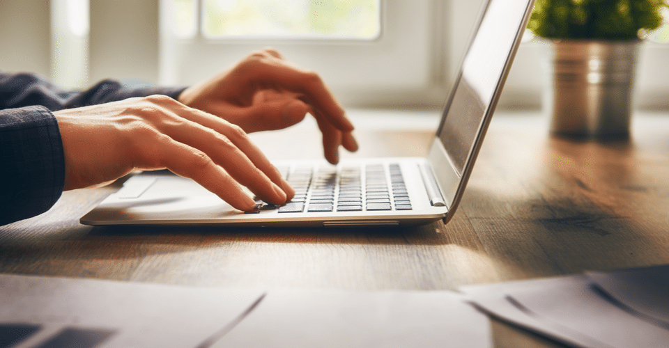 Professional setting up a staging site on his laptop