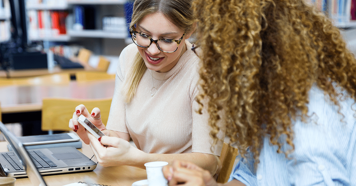 two women discuss the benefits of managed WordPress hosting