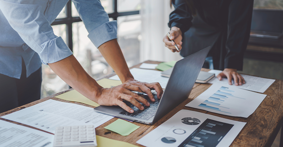 WooCommerce specialist working at desk